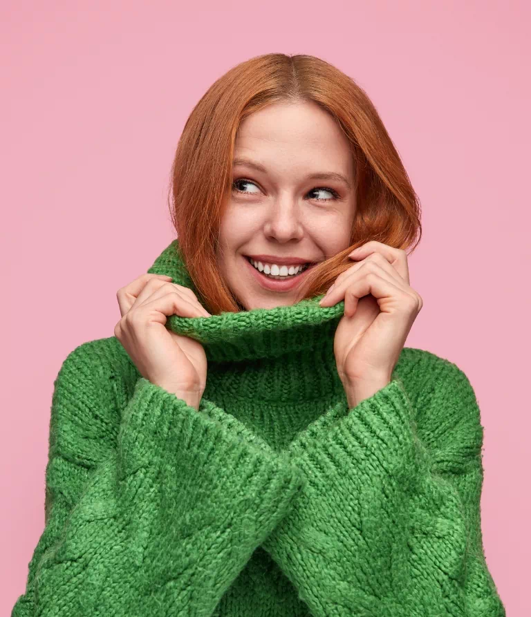zielony sweter
